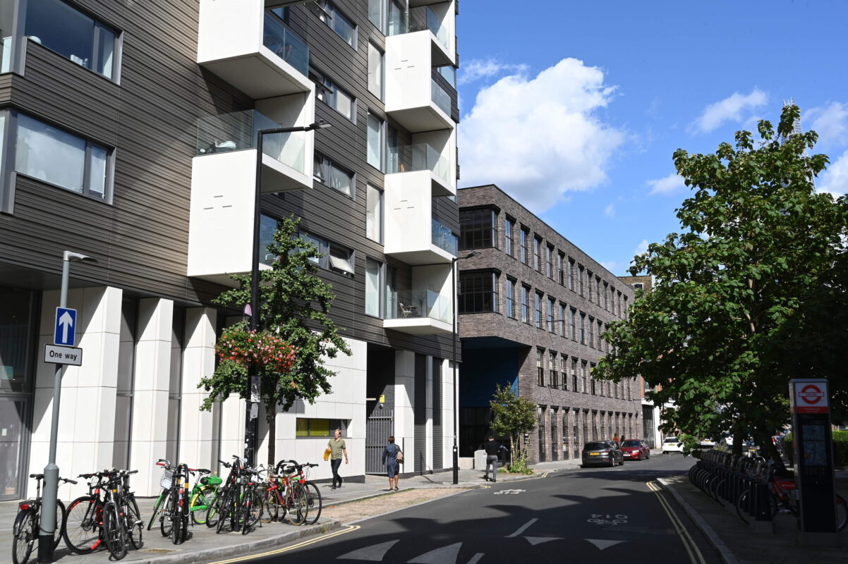 Showing Highway Diamond Elite street lights next to
 a city centre building.